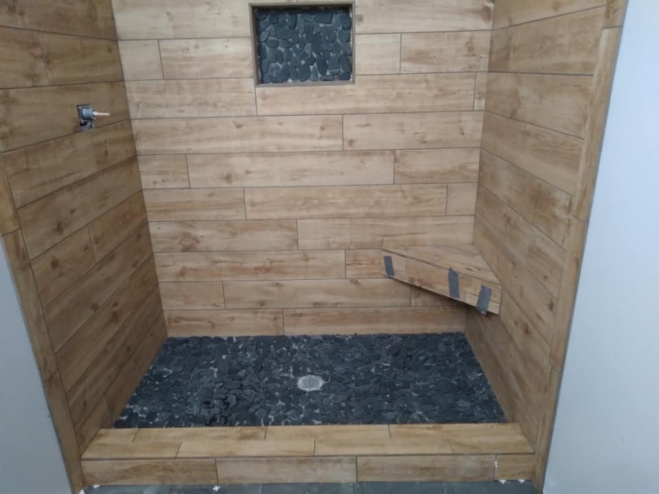 Custom full-bathroom tile remodel completed by Heart of Texas Flooring in Central Texas