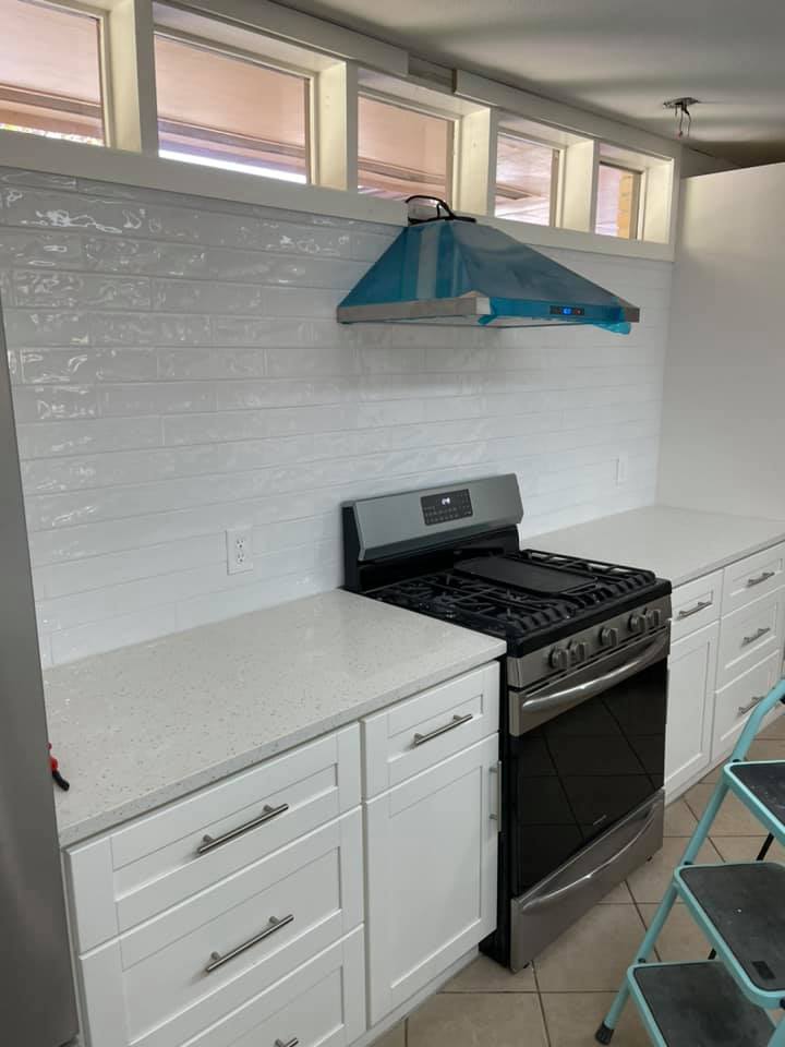 White subway tile kitchen backsplash installed by Heart of Texas Flooring Brownwood TX