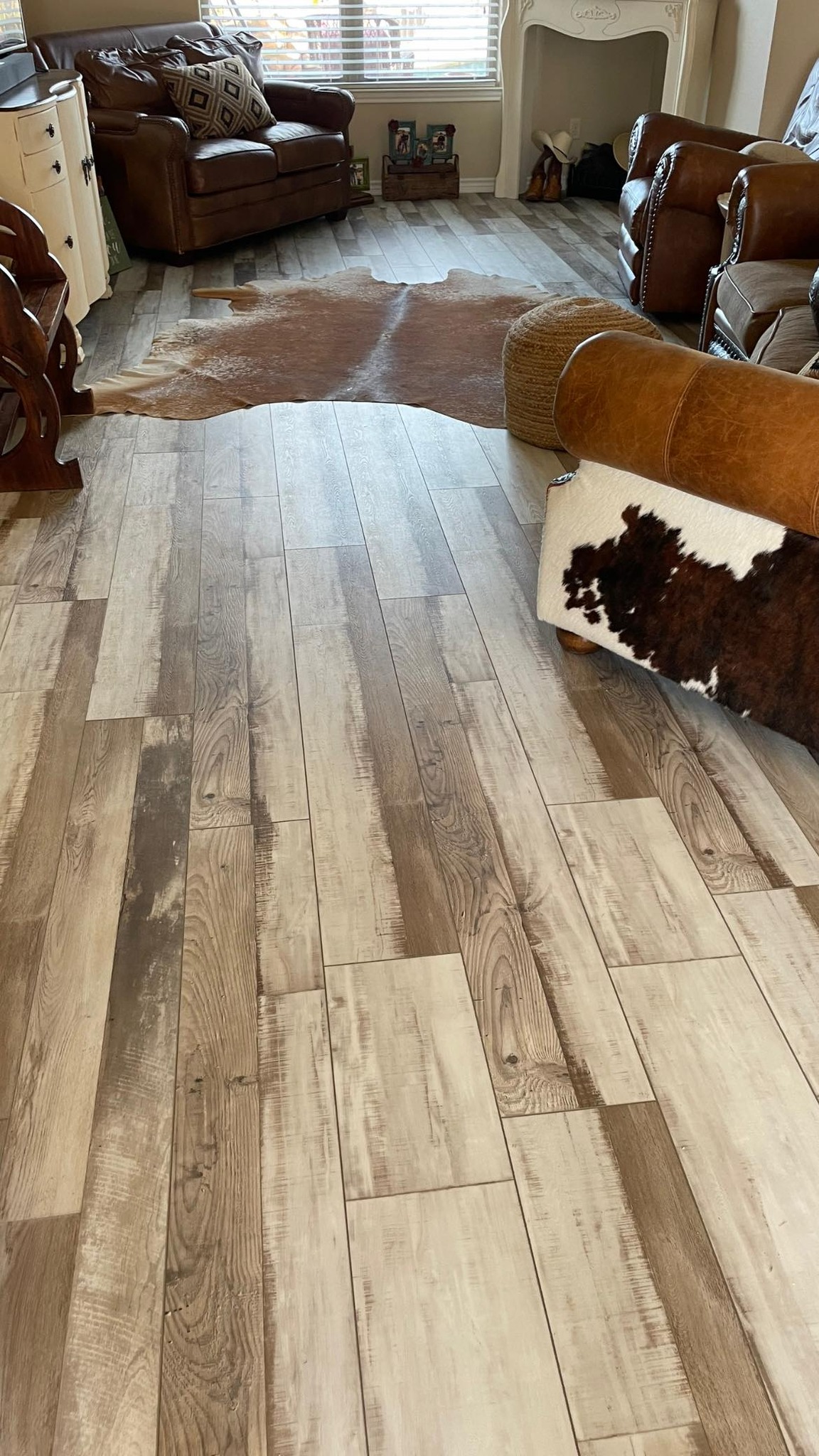 Luxury vinyl plank flooring installed in a Brownwood TX living room by Heart of Texas Flooring